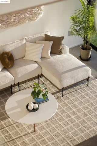 a bedroom with a bed and a balcony