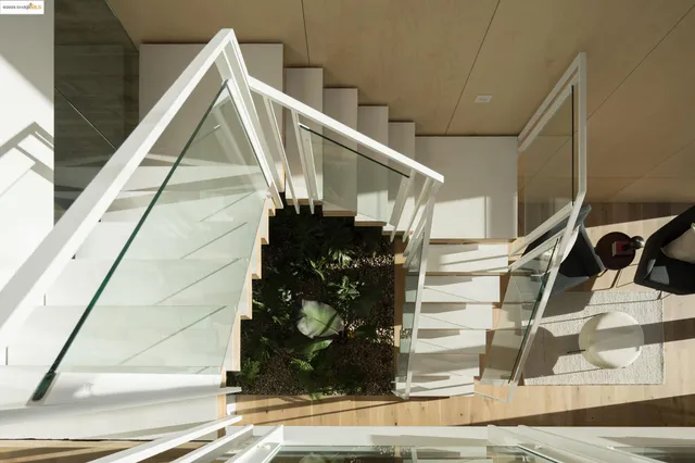 a living room with large windows