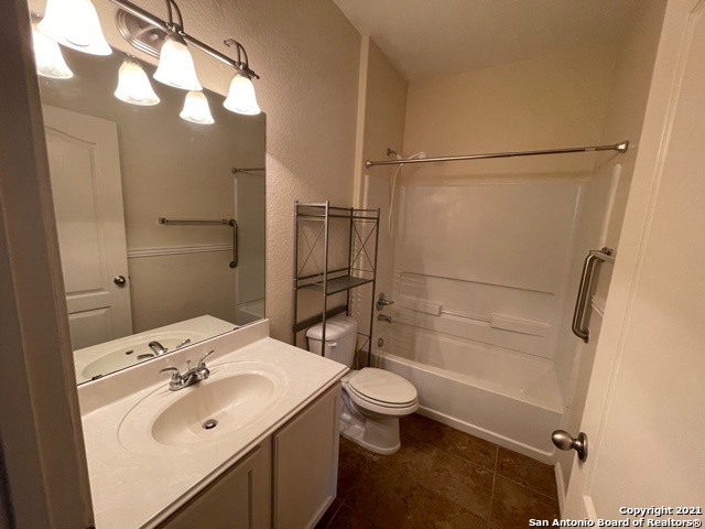 434 Tequila Ranch San Antonio, TX 78245 - Photo 12 of 21 a bathroom with a sink a toilet and shower