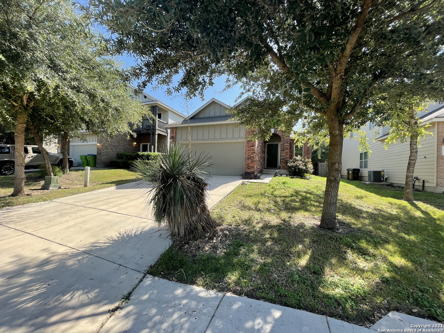 434 Tequila Ranch San Antonio, TX 78245 - Photo 2 of 21 a view of a yard with plants and trees
