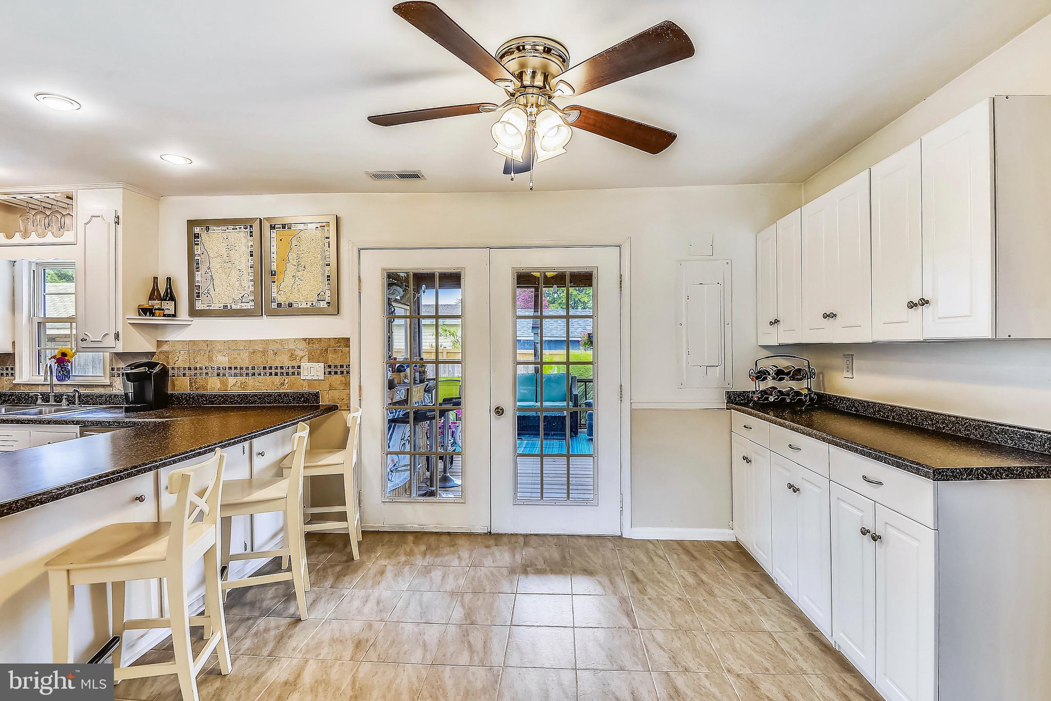 1354 Calvert Road Chester, MD 21619 - Photo 16 of 47 Kitchen Leads to Screened Porch
