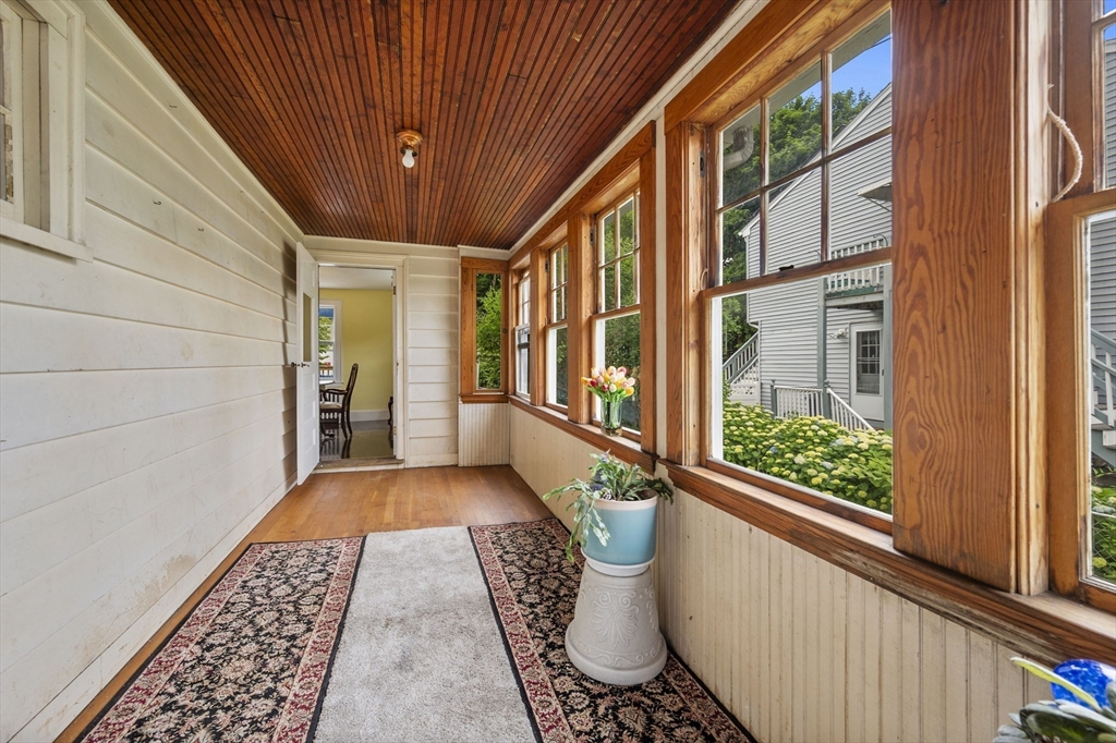 12 Riverside Avenue Gloucester, MA 01930 - Photo 19 of 40 a view of balcony with wooden floor