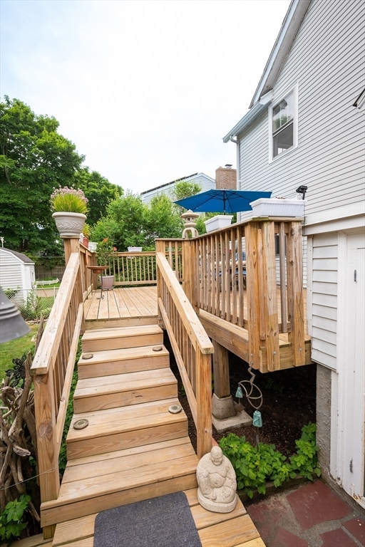 12 Riverside Avenue Gloucester, MA 01930 - Photo 33 of 40 a view of a patio with couches next to a yard