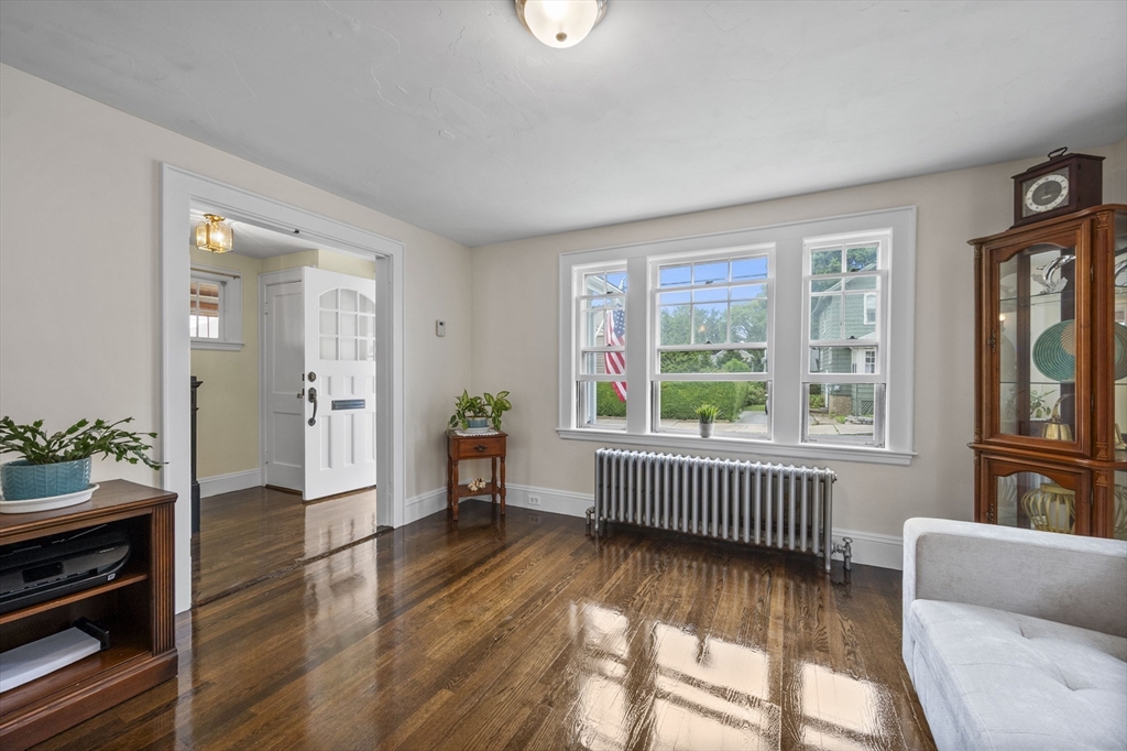 12 Riverside Avenue Gloucester, MA 01930 - Photo 10 of 40 a view of livingroom with furniture wooden floor and windows