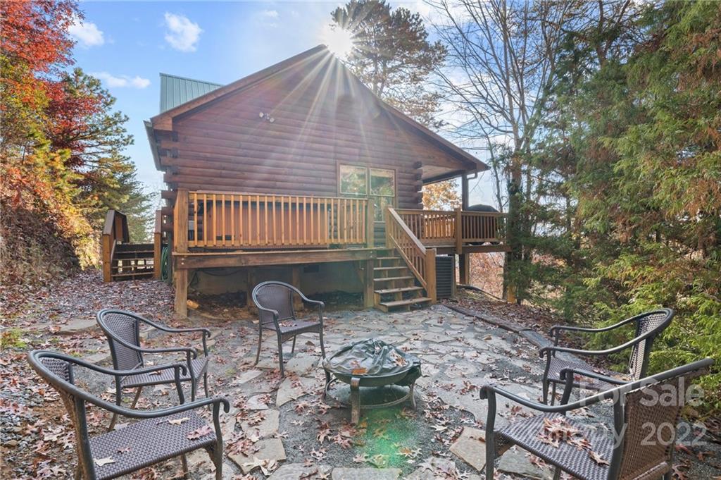 85 Cloud Ten Road Bryson City, NC 28713 - Photo 3 of 26 a backyard of a house with outdoor seating