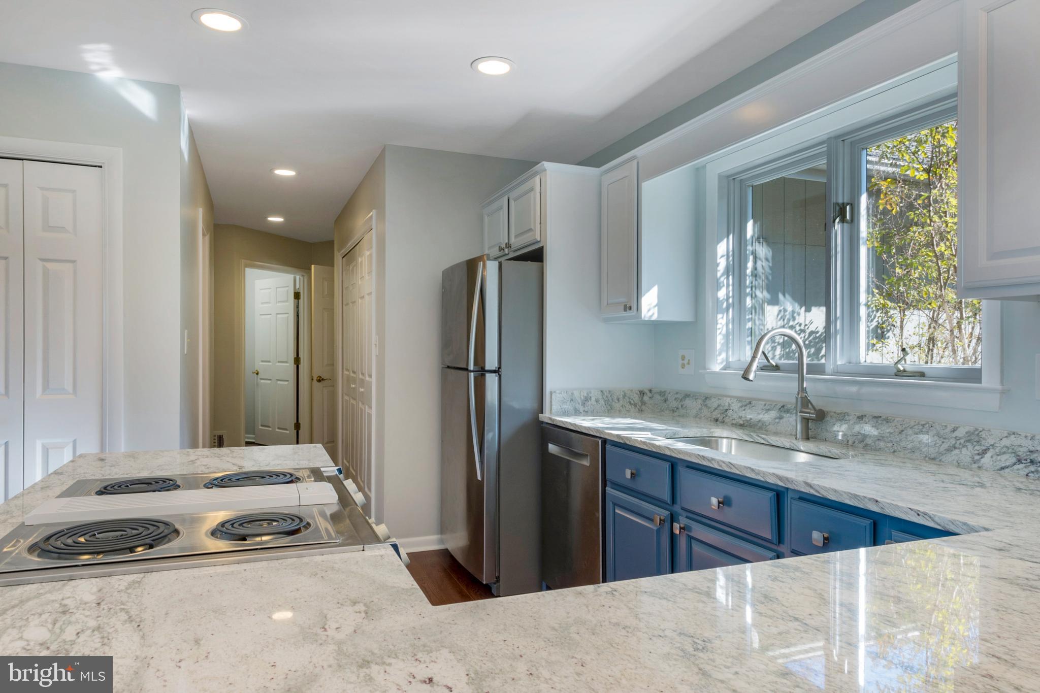 1824 Pleasant Plains Road Annapolis, MD 21409 - Photo 23 of 82 Clean and fresh kitchen looks out to level lawn