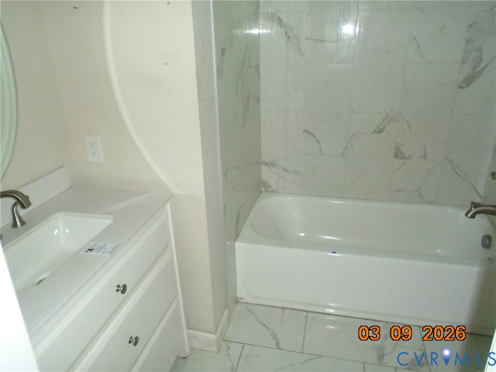 1807 T Street Richmond, VA 23223 - Photo 5 of 11 Bathroom featuring vanity, light marble finish flo