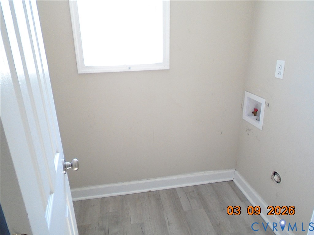 1807 T Street Richmond, VA 23223 - Photo 7 of 11 Laundry room featuring light wood-type flooring an