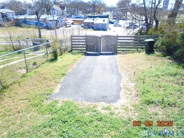 a view of swimming pool with a yard