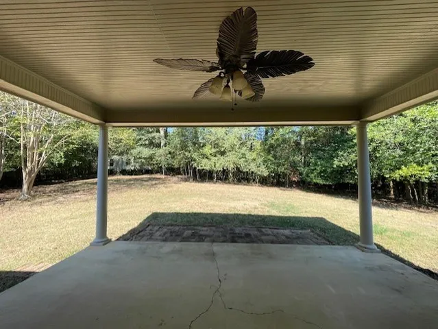 a view of a porch and garden