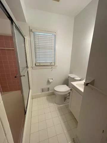 a bathroom with a toilet
