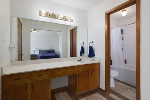 a view of a livingroom with wooden floor