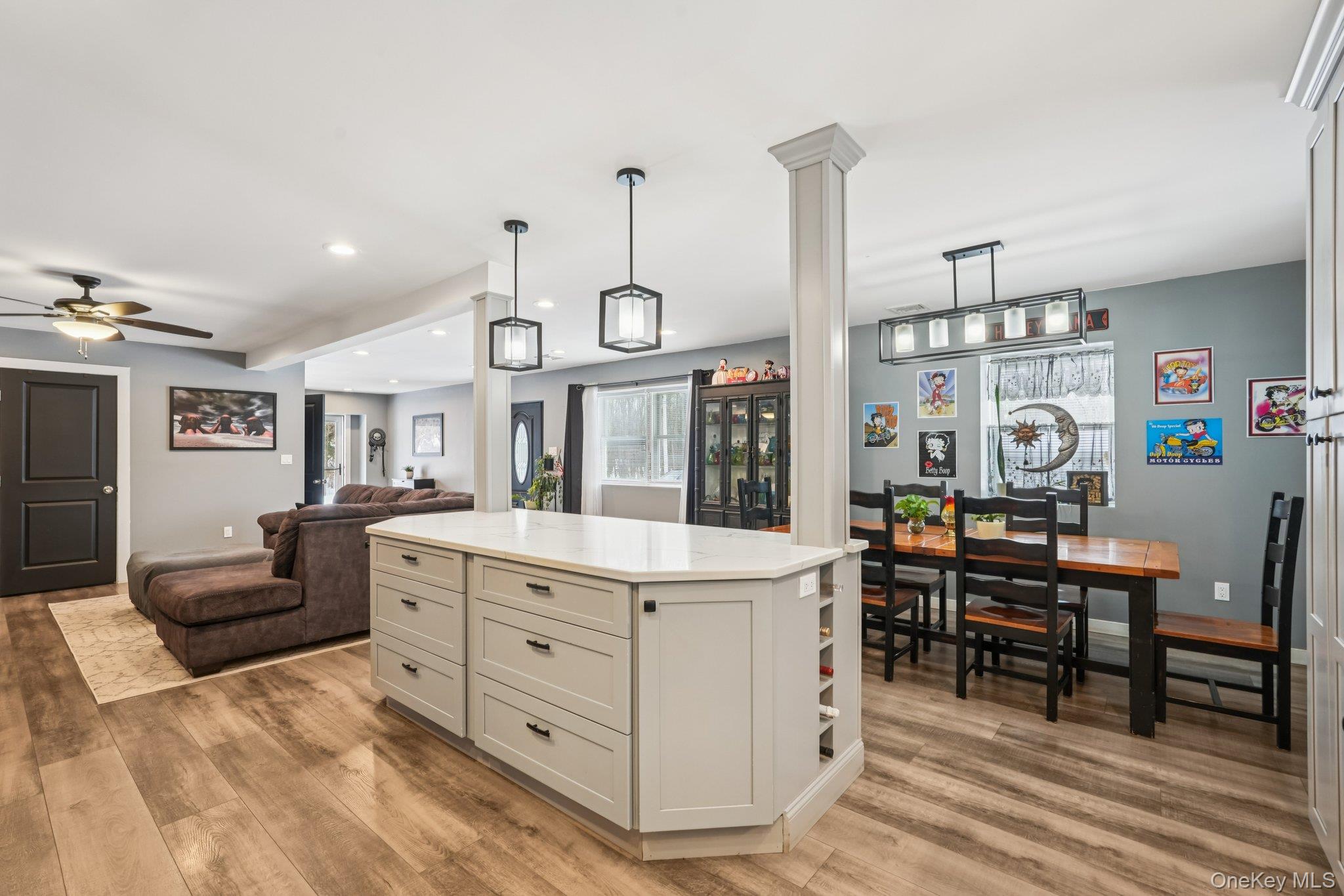 184 Quaker Street Wallkill, NY 12589 - Photo 34 of 35 a large living room with stainless steel appliances kitchen island granite countertop furniture and a living room