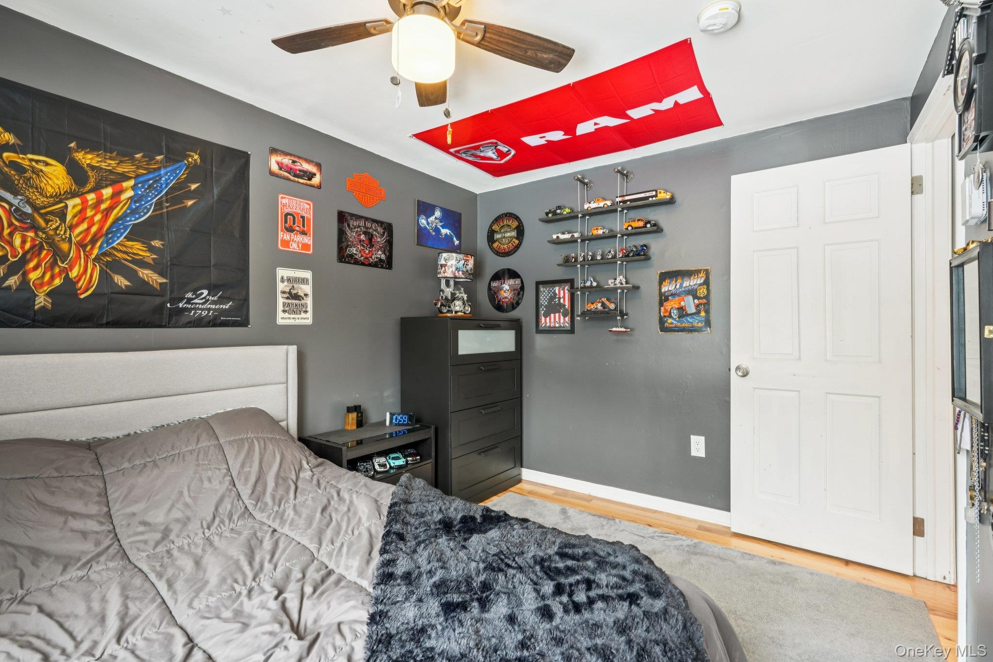 184 Quaker Street Wallkill, NY 12589 - Photo 24 of 35 a bed room with a bed and a television