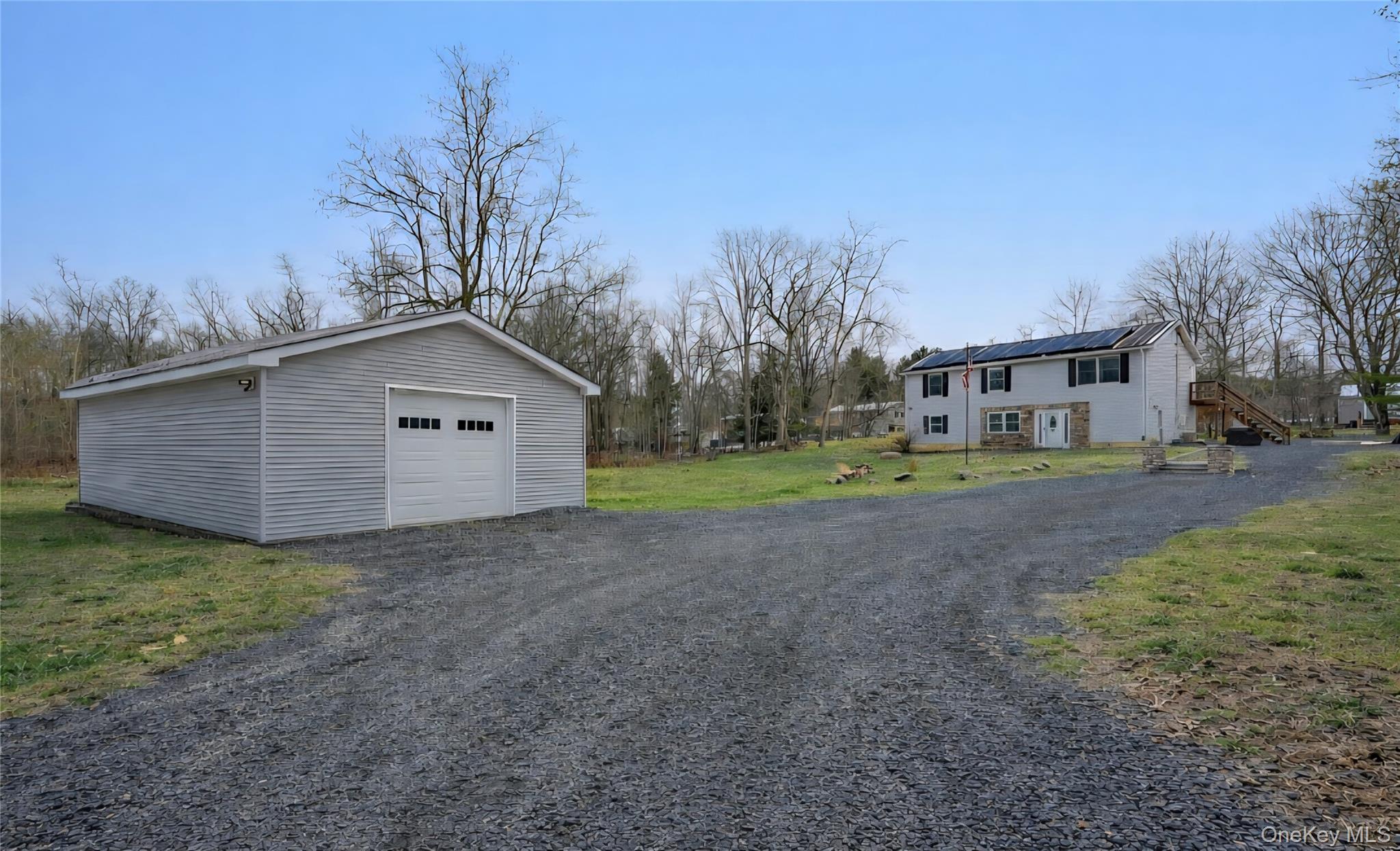 184 Quaker Street Wallkill, NY 12589 - Photo 32 of 35 a view of a house with a yard