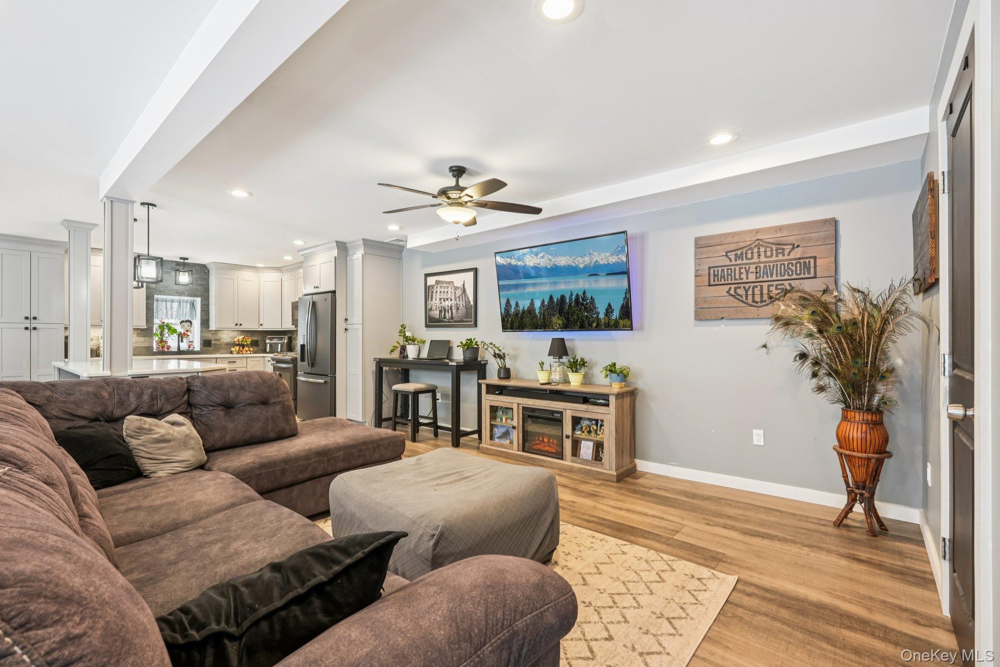 184 Quaker Street Wallkill, NY 12589 - Photo 4 of 35 a living room with furniture and a flat screen tv