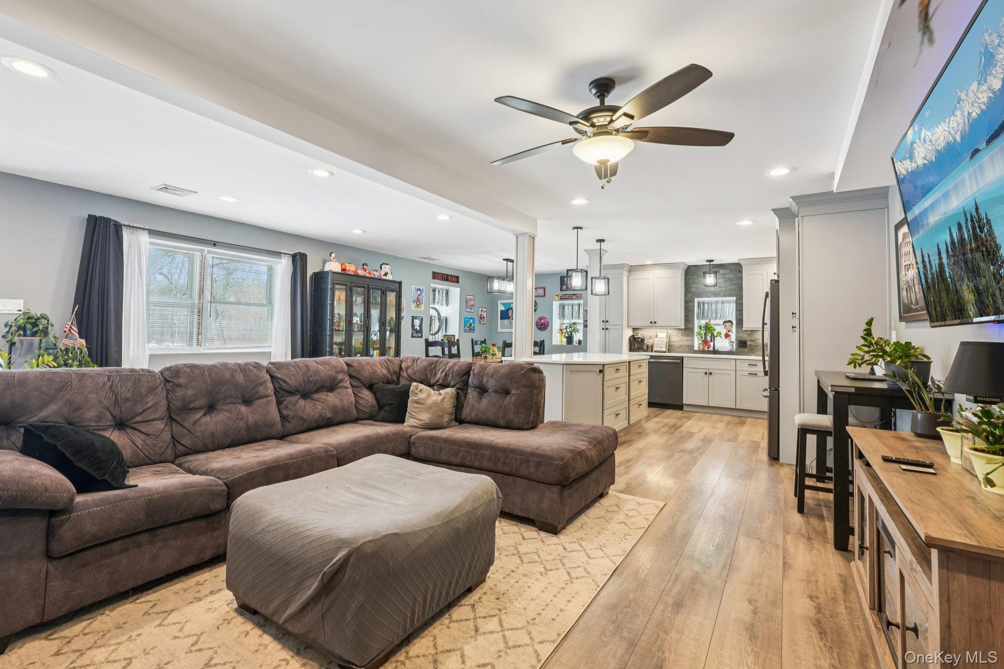 184 Quaker Street Wallkill, NY 12589 - Photo 5 of 35 a living room with furniture and kitchen view