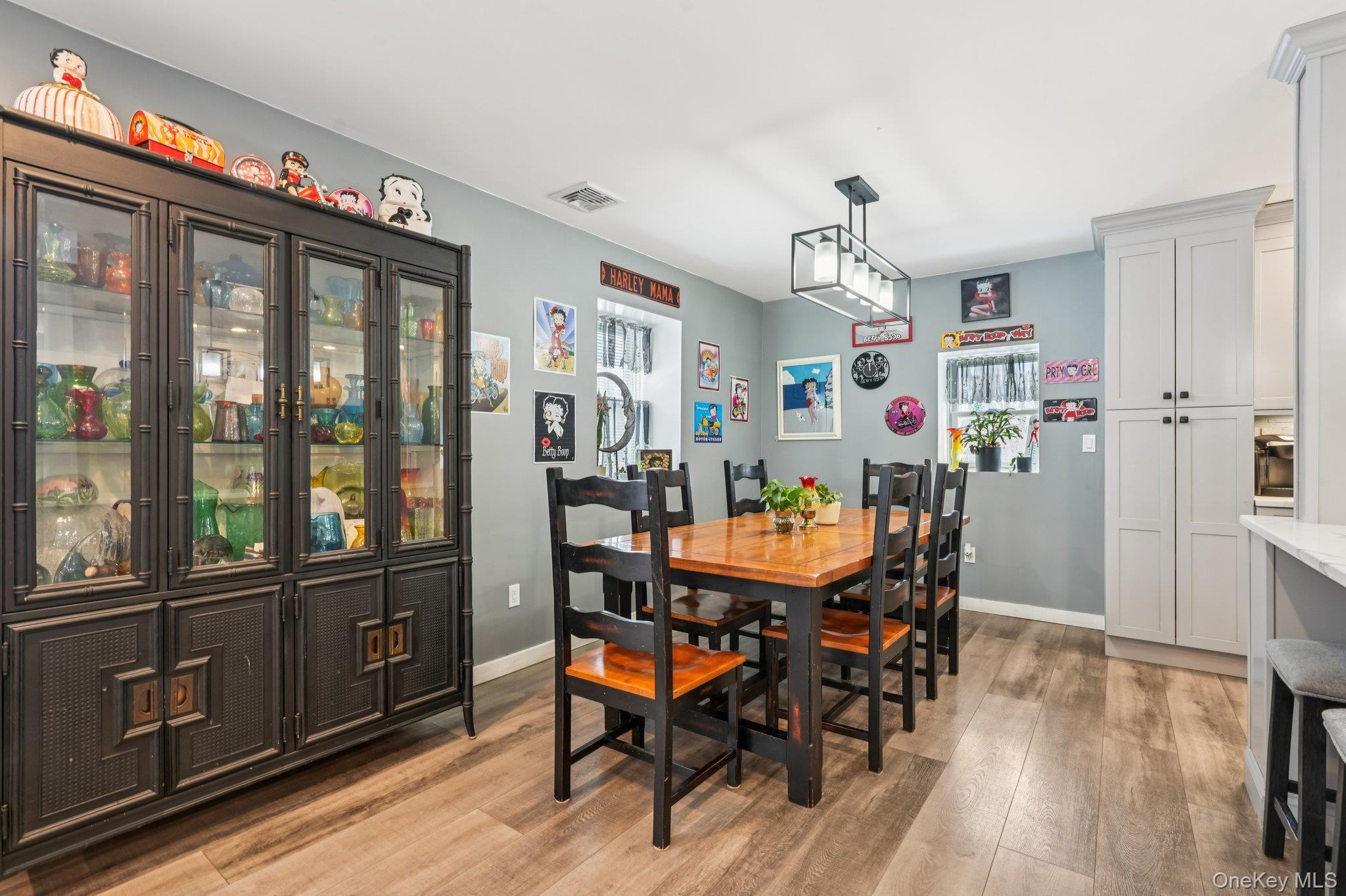 184 Quaker Street Wallkill, NY 12589 - Photo 7 of 35 a view of a dining room with furniture window and wooden floor