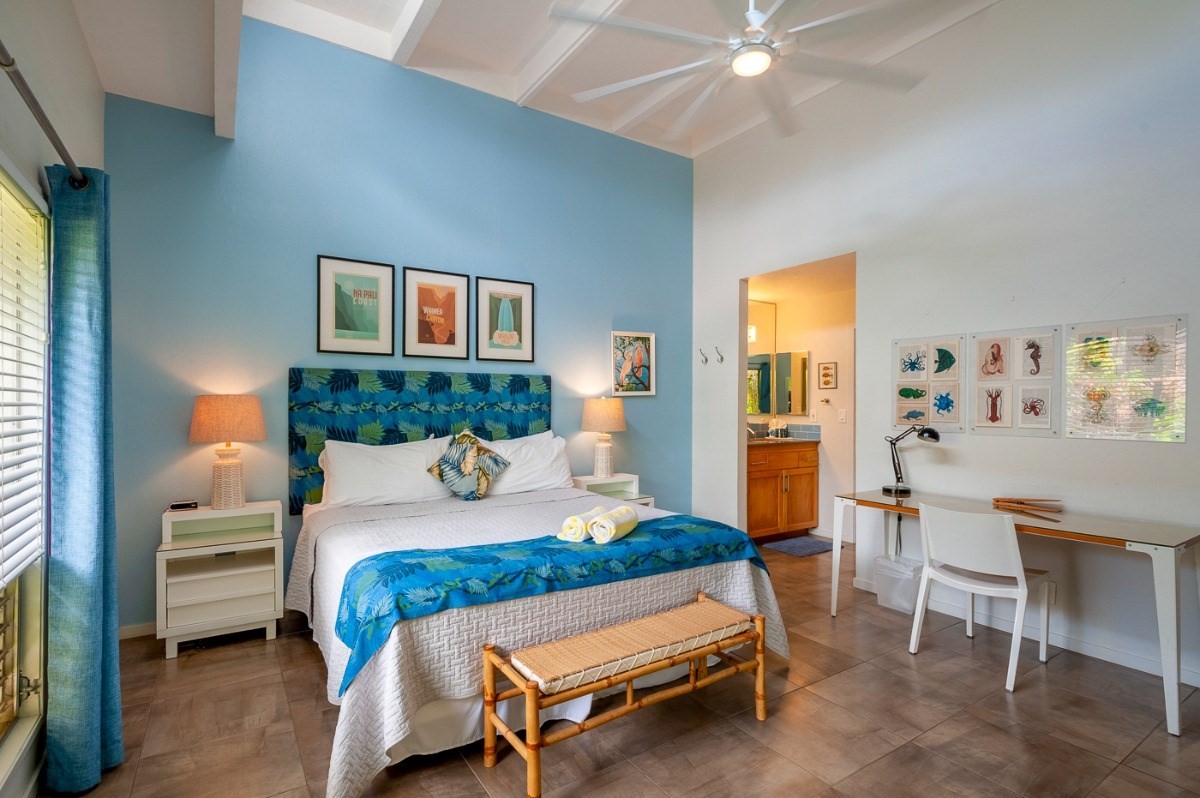 a bedroom with a bed and a cabinets