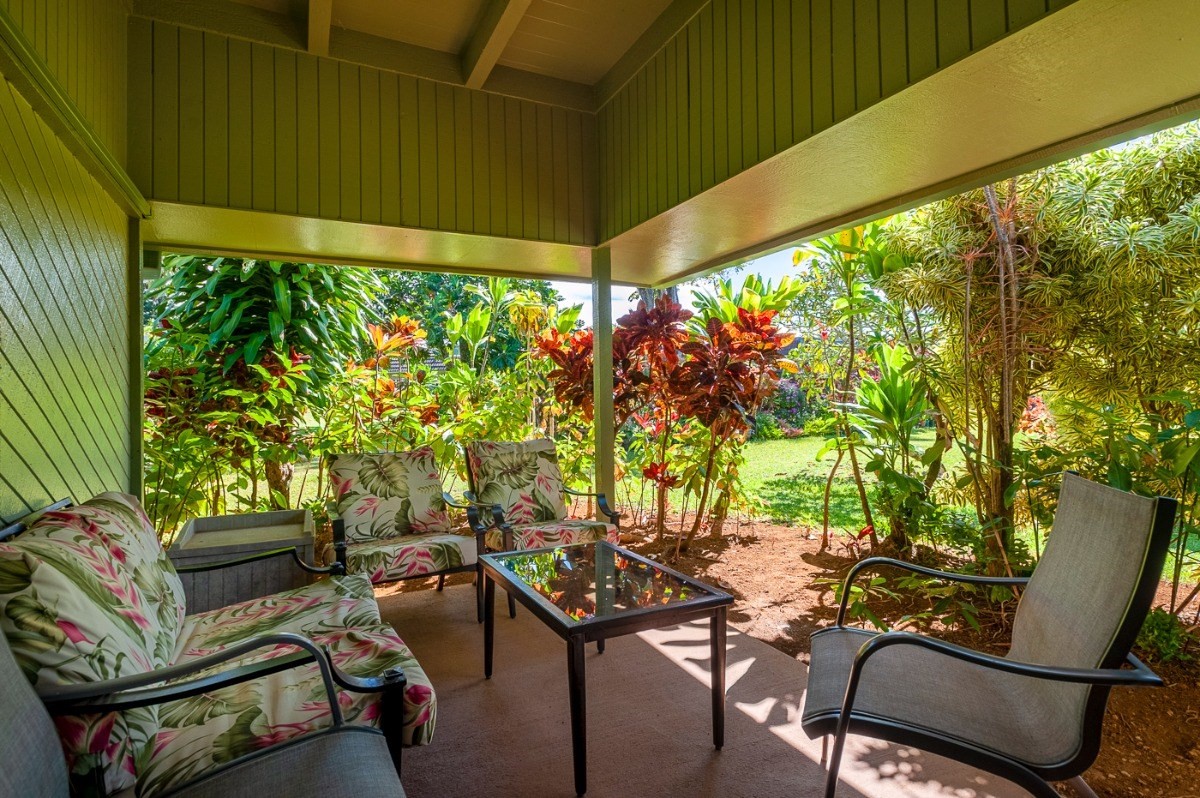3880 Wyllie Road, Unit 1A Princeville, HI 96722 - Photo 13 of 22 a view of a chairs and table in patio with a patio