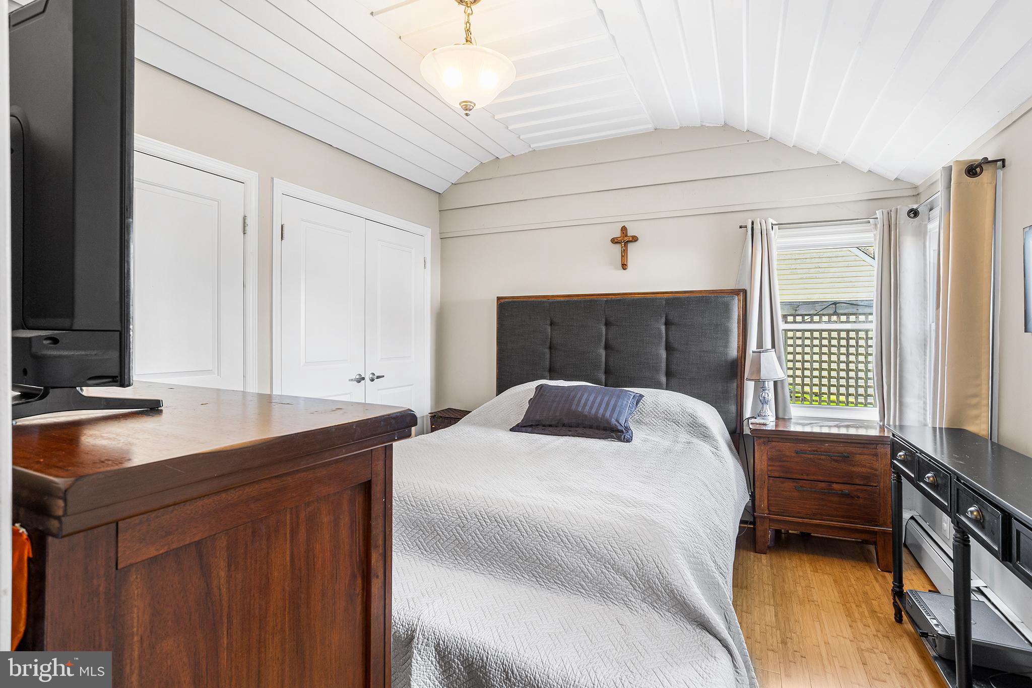 48 Falmouth Road Hamilton, NJ 08620 - Photo 13 of 34 a bedroom with a bed and a desk