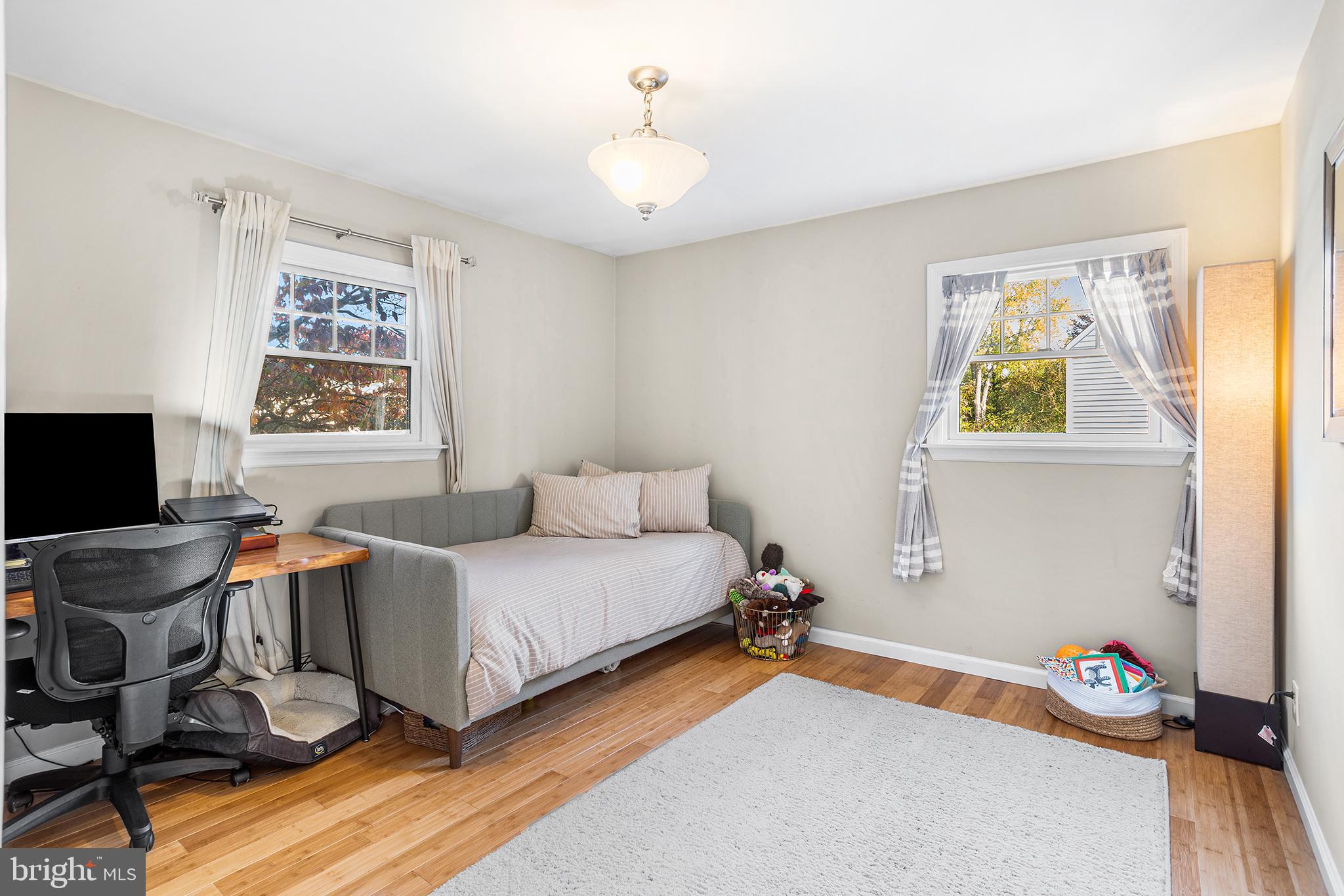 48 Falmouth Road Hamilton, NJ 08620 - Photo 17 of 34 a bedroom with a bed and a window