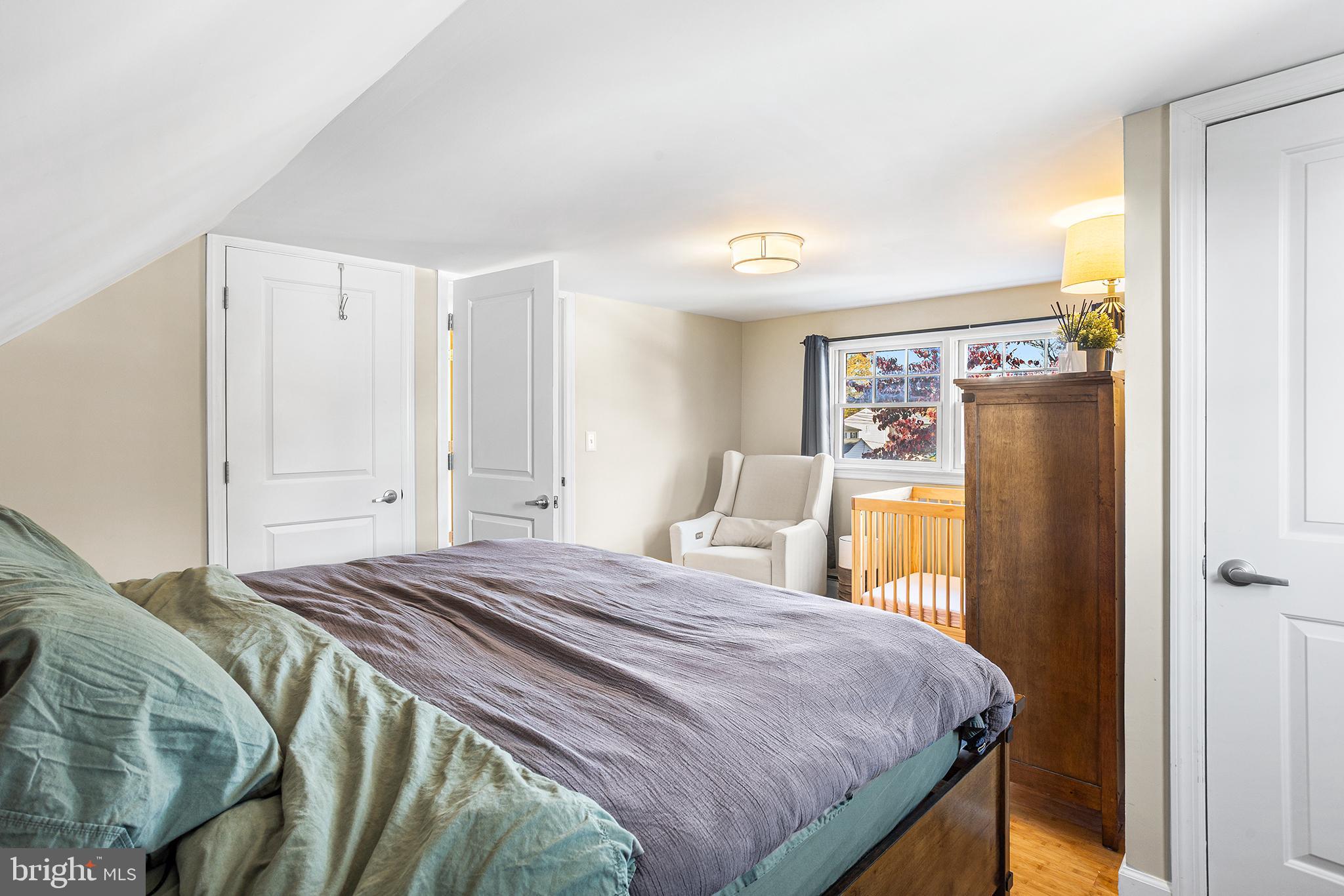 48 Falmouth Road Hamilton, NJ 08620 - Photo 24 of 34 a bedroom with a bed and a window