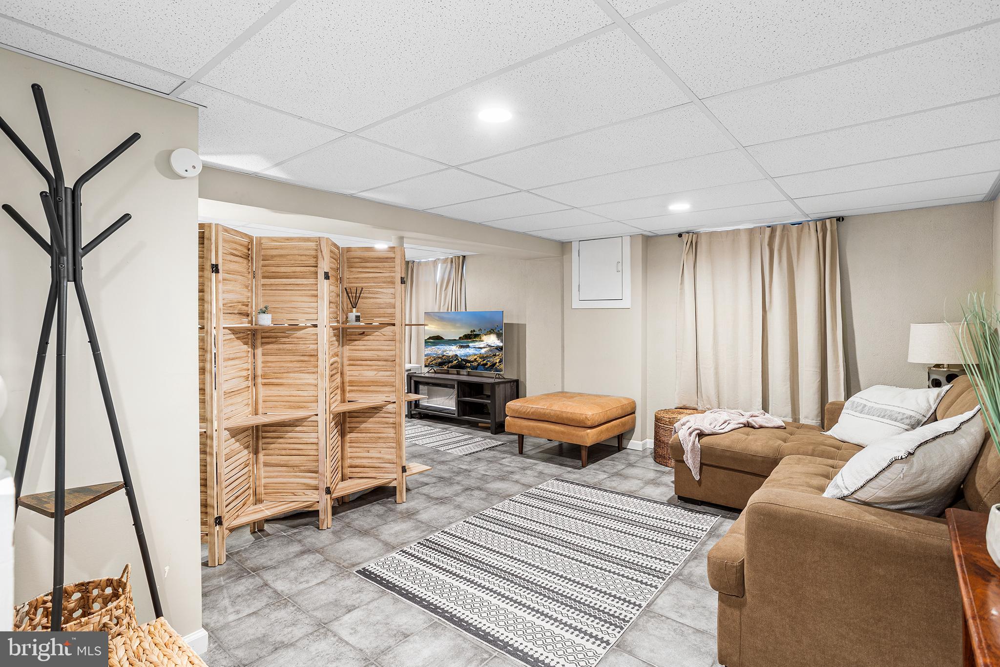 48 Falmouth Road Hamilton, NJ 08620 - Photo 25 of 34 a bedroom with furniture and a wooden floor