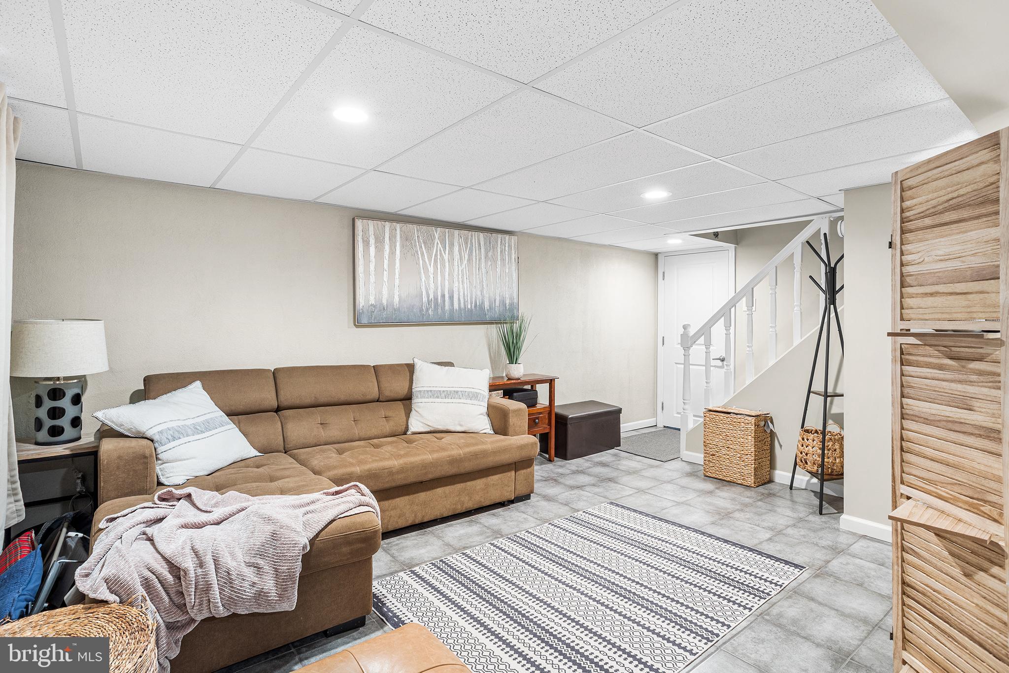48 Falmouth Road Hamilton, NJ 08620 - Photo 26 of 34 a living room with furniture and a couch