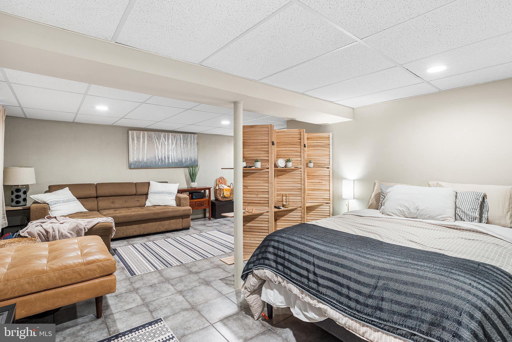 48 Falmouth Road Hamilton, NJ 08620 - Photo 28 of 34 a bedroom with furniture and a wooden floor