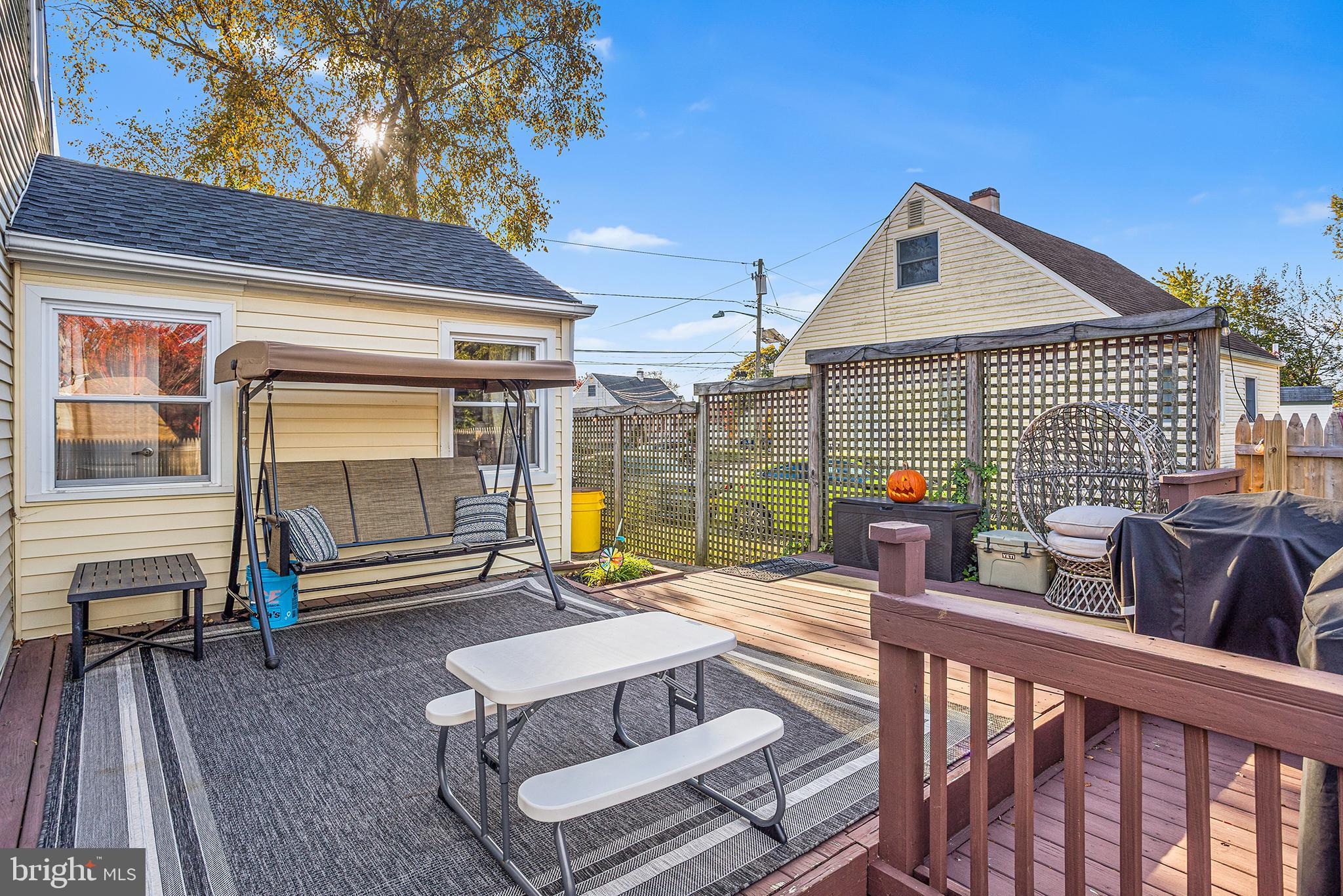 48 Falmouth Road Hamilton, NJ 08620 - Photo 30 of 34 a view of a roof deck with couches and wooden floor