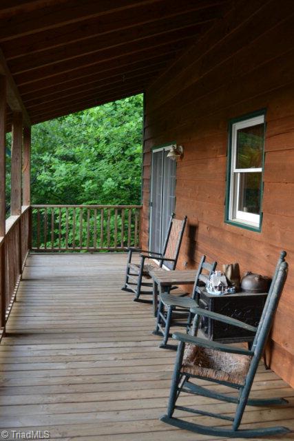 386 Hickory Hollow Road Purlear, NC 28665 - Photo 8 of 28 Back Covered Porch
