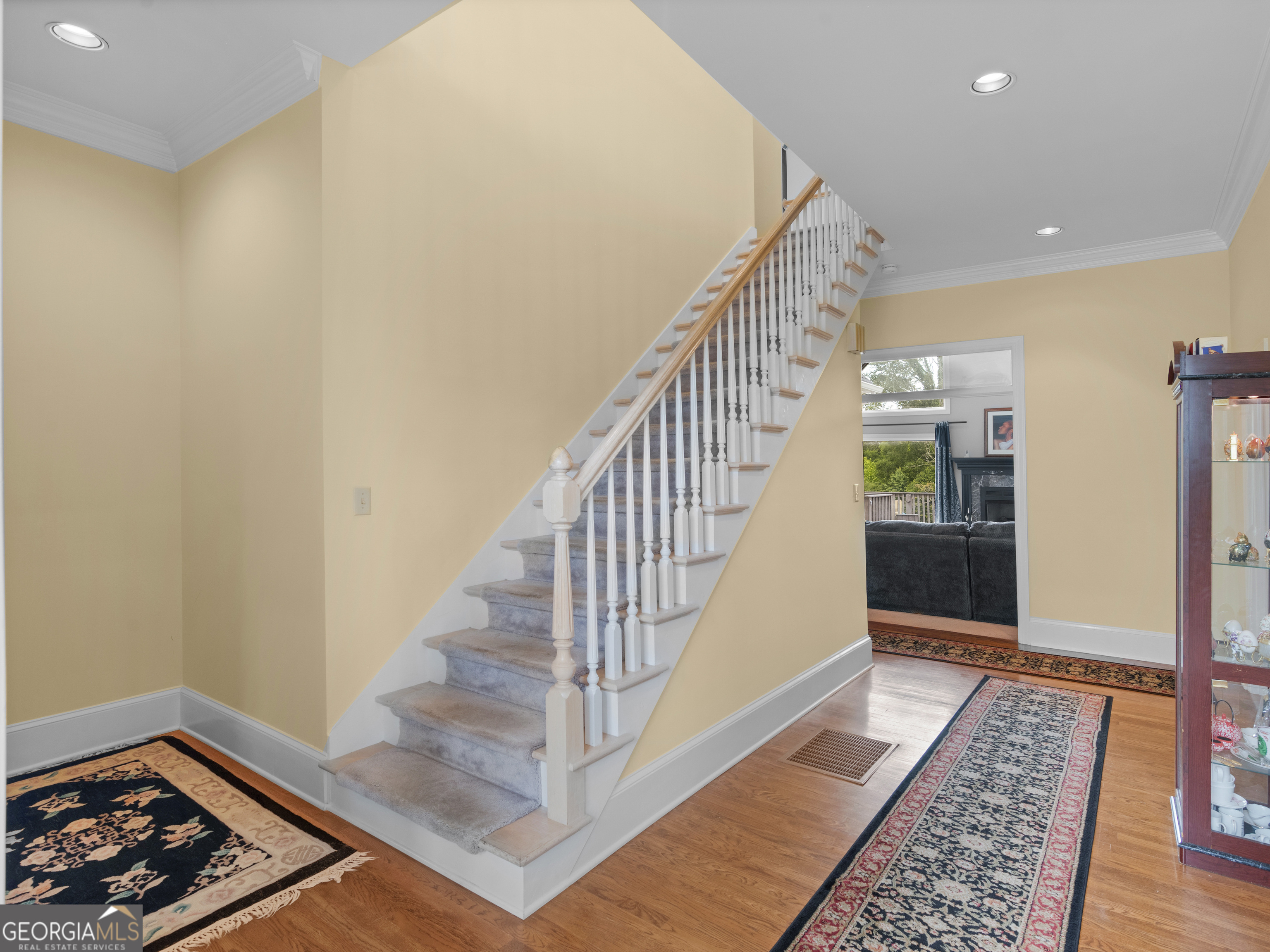 474 North Rover Road Williamson, GA 30292 - Photo 23 of 89 a view of entryway and hall with wooden floor