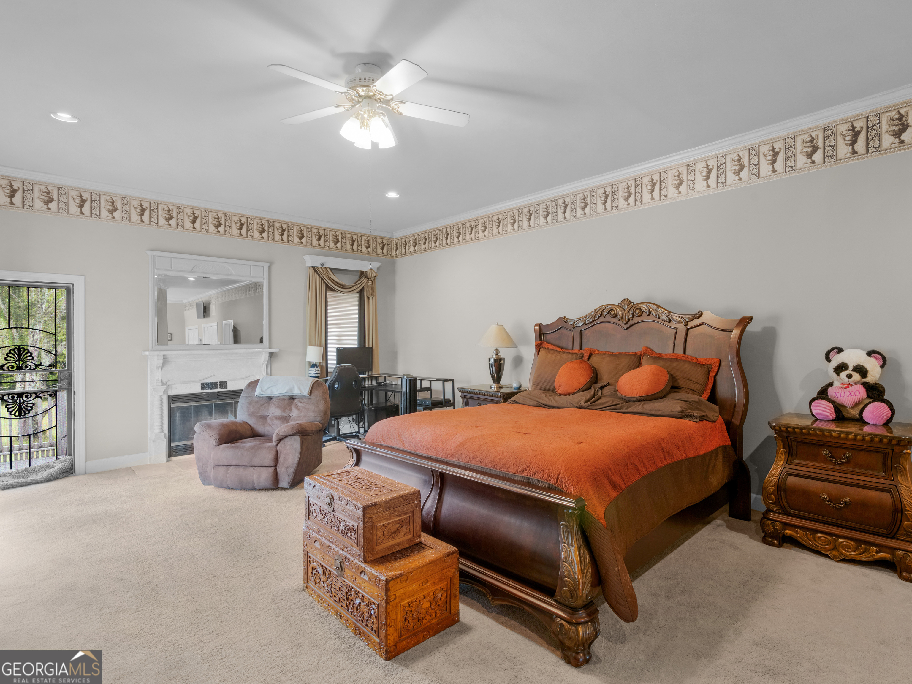 474 North Rover Road Williamson, GA 30292 - Photo 28 of 89 a bedroom with a bed and ceiling fan