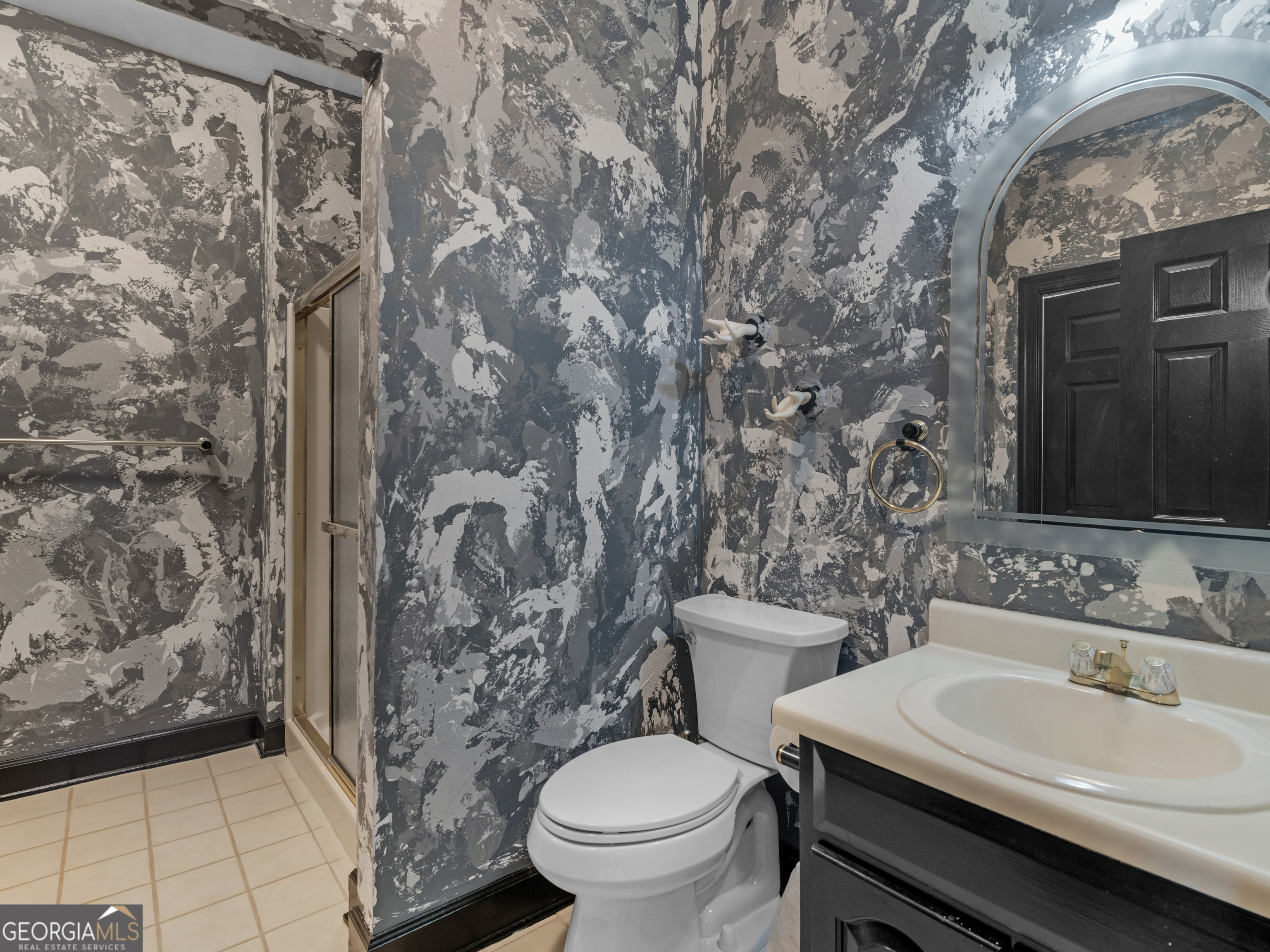 474 North Rover Road Williamson, GA 30292 - Photo 53 of 89 a bathroom with a granite countertop toilet and a sink