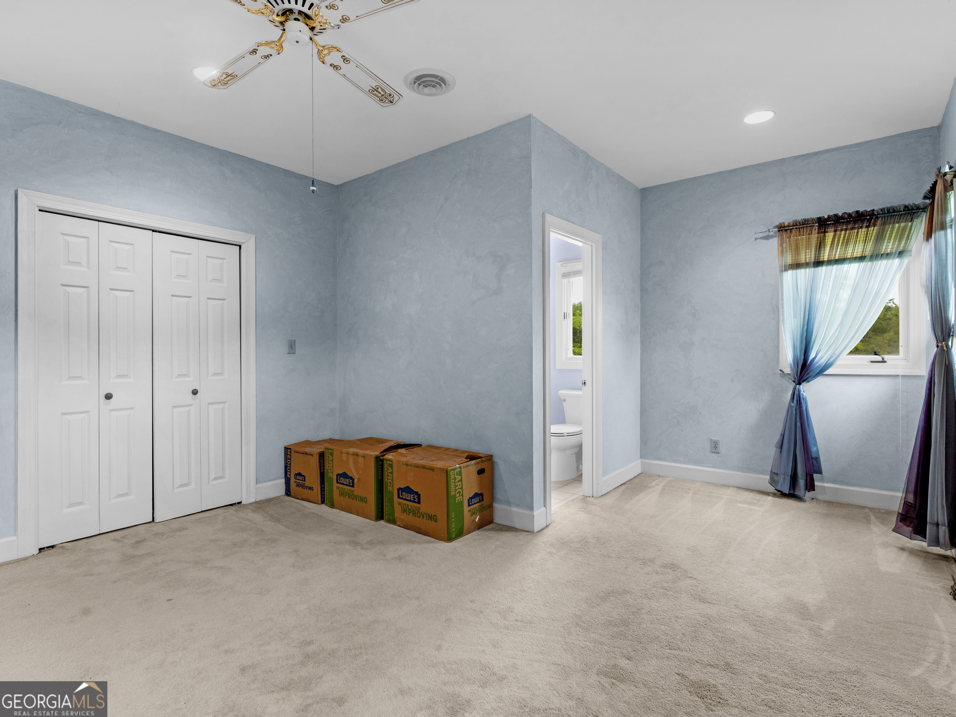 474 North Rover Road Williamson, GA 30292 - Photo 57 of 89 a view of a livingroom with a staircase