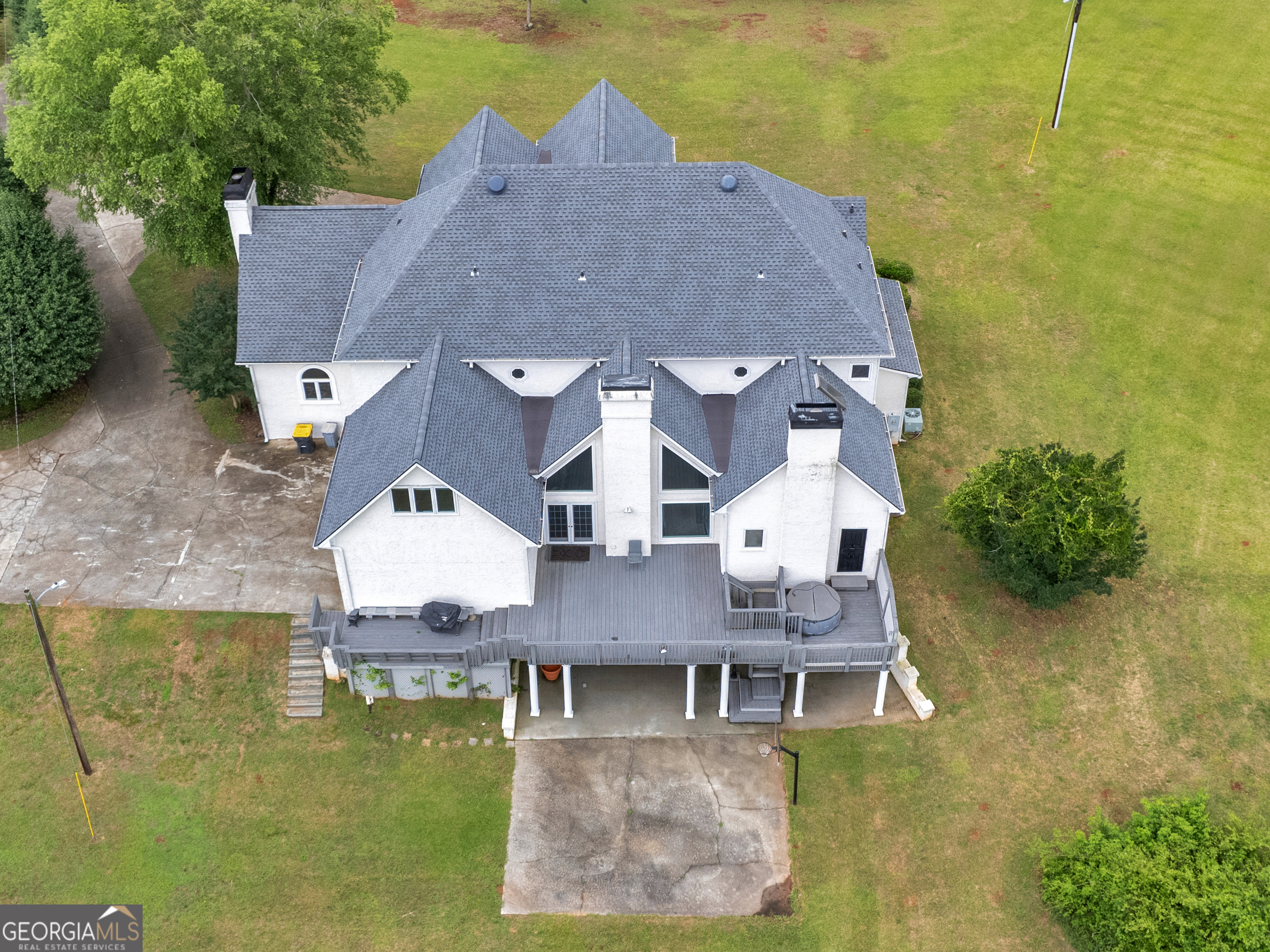 474 North Rover Road Williamson, GA 30292 - Photo 89 of 89 a aerial view of a house with swimming pool and a yard