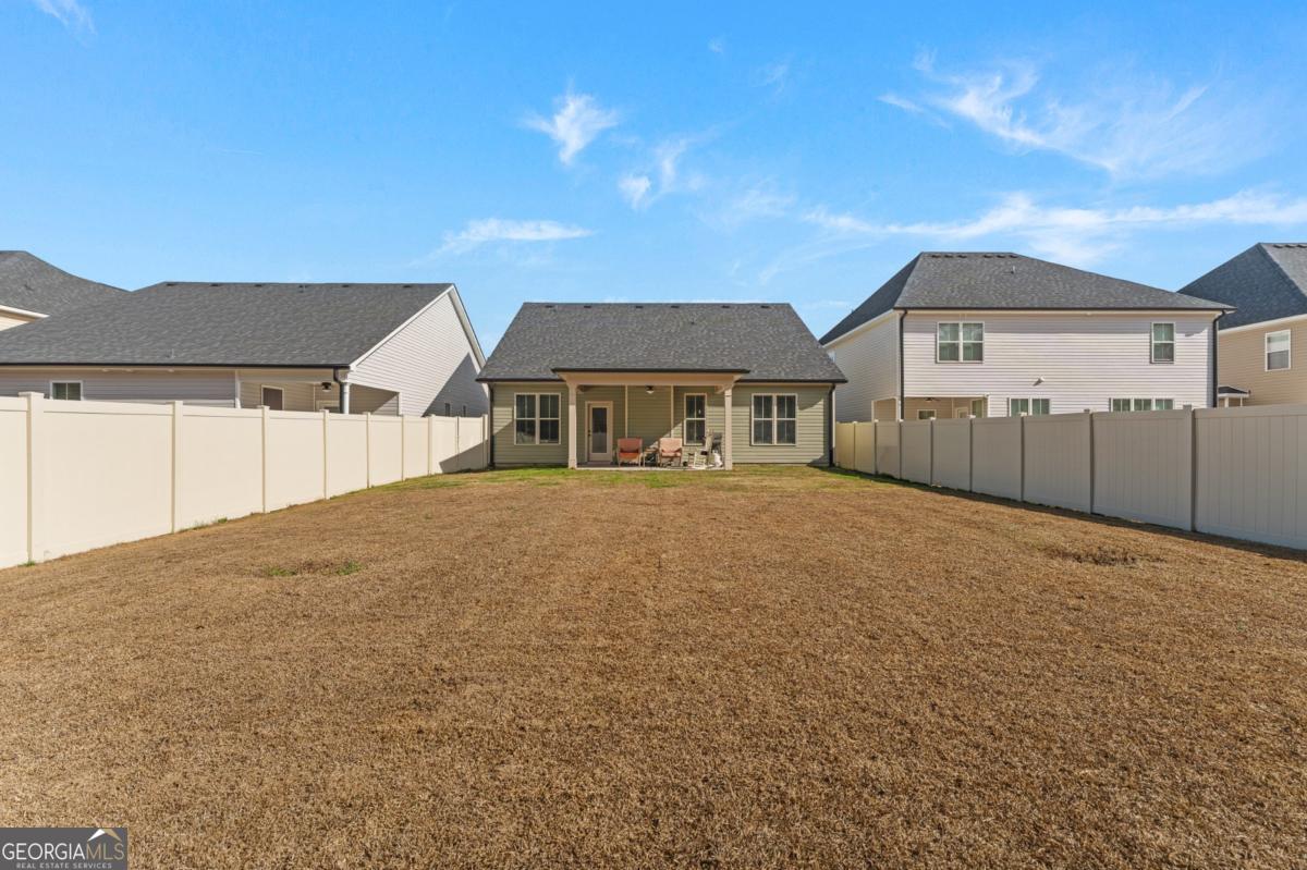 161 Laguna Way Savannah, GA 31405 - Photo 32 of 33 a front view of a house with a yard