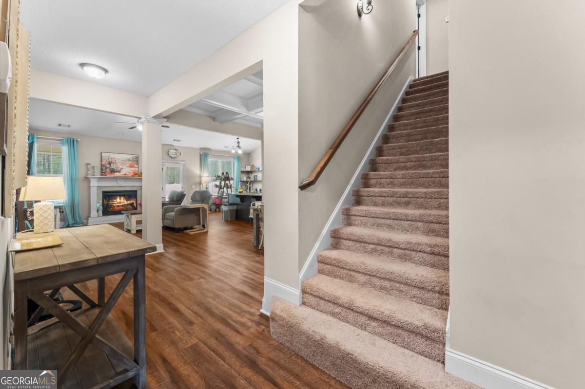 161 Laguna Way Savannah, GA 31405 - Photo 8 of 33 a view of entryway and hall with dining room