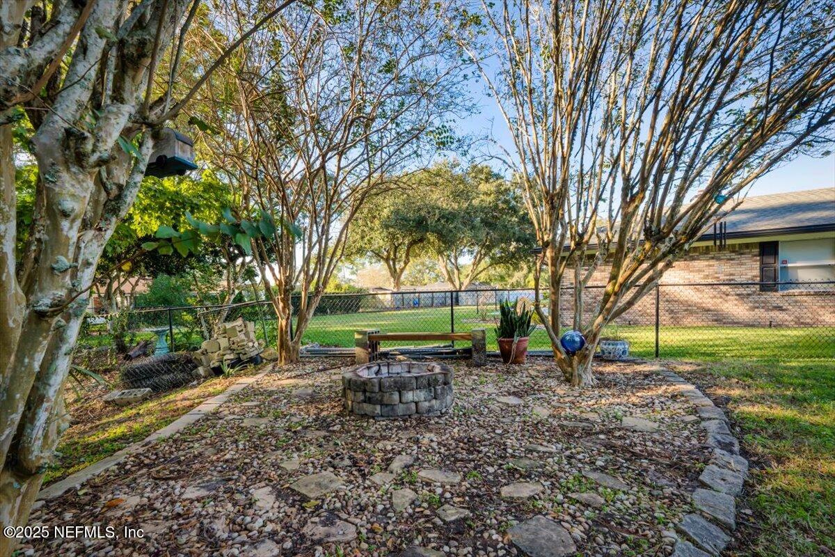 9160 Runnymeade Road Jacksonville, FL 32257 - Photo 8 of 40 Fire Pit Sitting Area