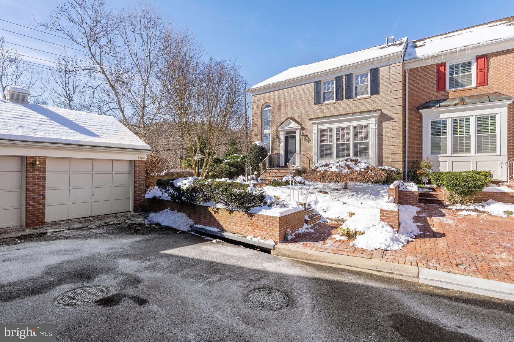 8300 Rising Ridge Way Bethesda, MD 20817 - Photo 2 of 28 Front Elevation with 2 Car Garage