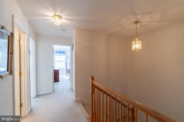 a view of a hallway with front door