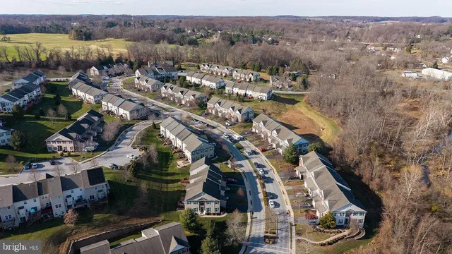 an aerial view of a city with lots of residential buildings