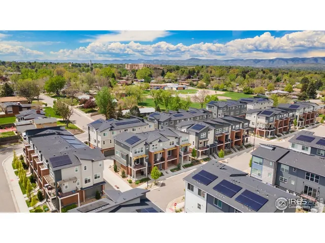 a view of city with ocean