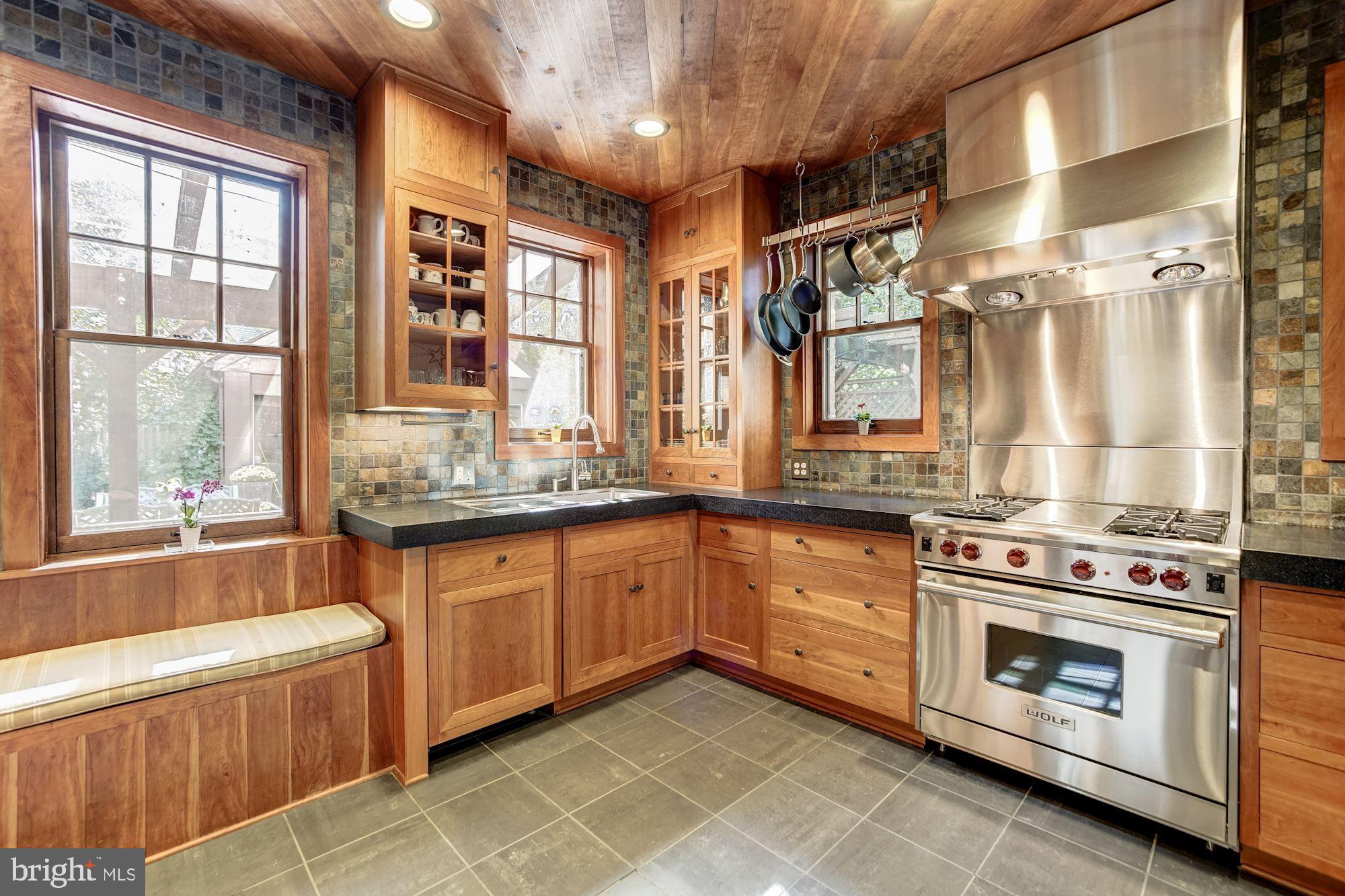 2840 Chesapeake Street Northwest Washington, DC 20008 - Photo 12 of 39 Custom kitchen with cherry cabinetry