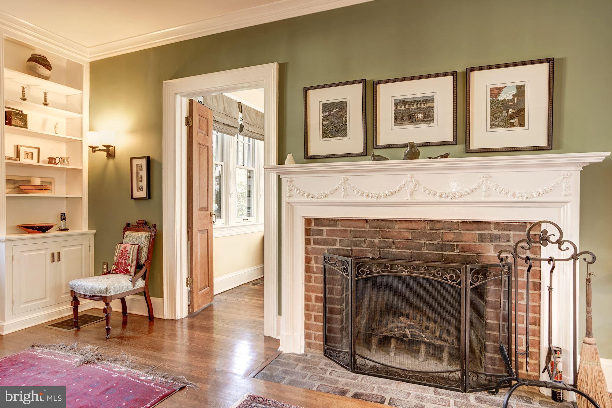 2840 Chesapeake Street Northwest Washington, DC 20008 - Photo 5 of 39 Wood burning fireplace with classic mantle