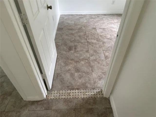 a view of a room that has a window in it