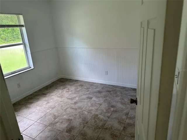an empty room with a window