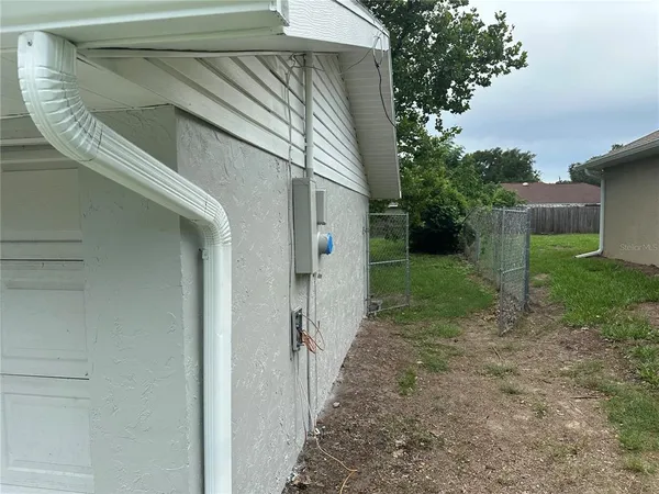 a view of a back yard of the house