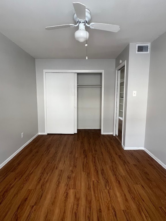 307 East 31st Street, Unit 208 Austin, TX 78705 - Photo 19 of 25 wooden floor in an empty room with a window